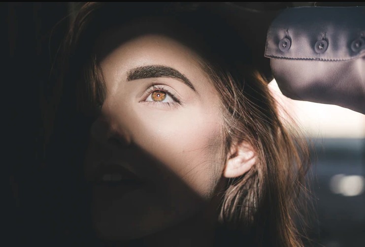 woman with a beautiful eyebrow