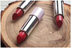 lipstick in metal cylinder containers