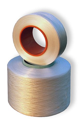 two spools of spandex fiber