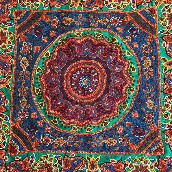 A hand-embroidered mandala tapestry