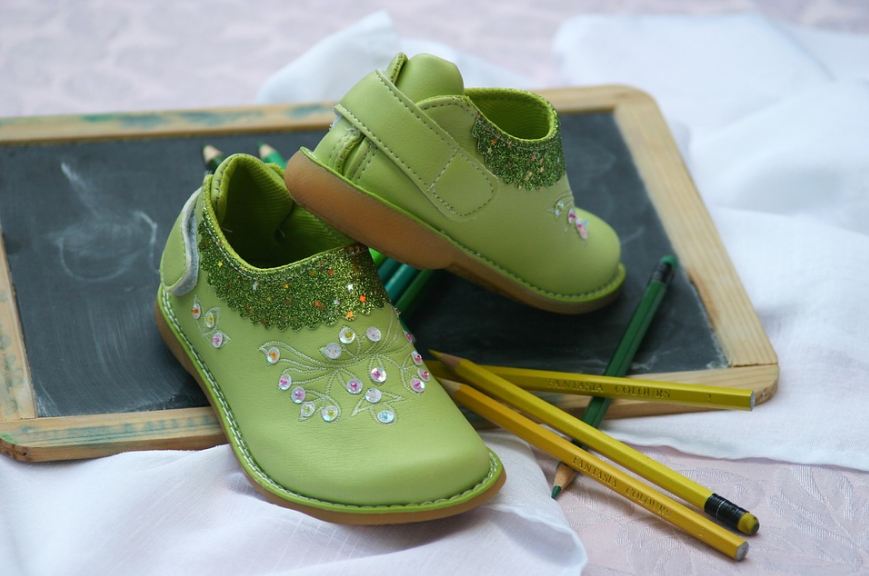 A very well customized shoe pair with rhinestones.