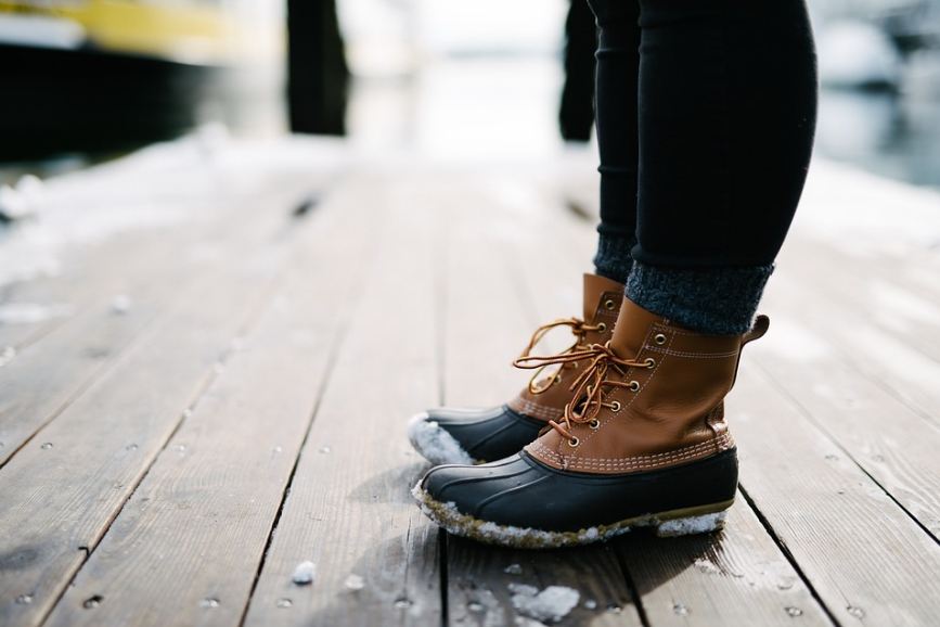 A winter boot is usually fully covered with to maintain internal temperature.