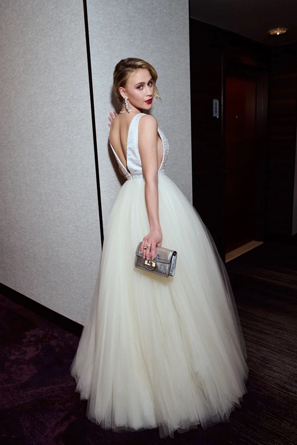 Maria Bakalova and Her Sparkling White Dress from Louis Vuitton