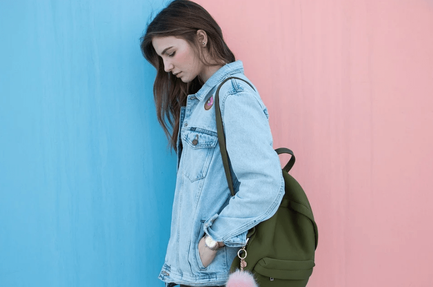 lady in denim jacket and bag