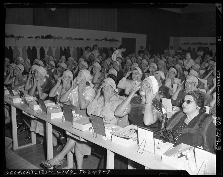 A cosmetic class being held in the 1950s