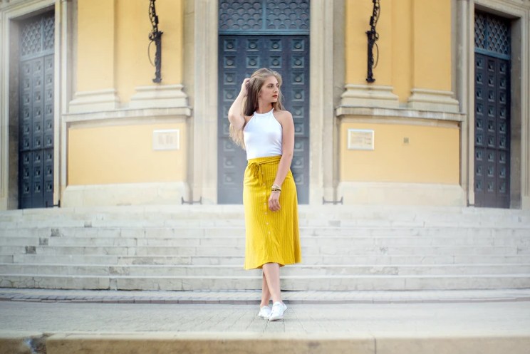 woman wearing yellow skirt