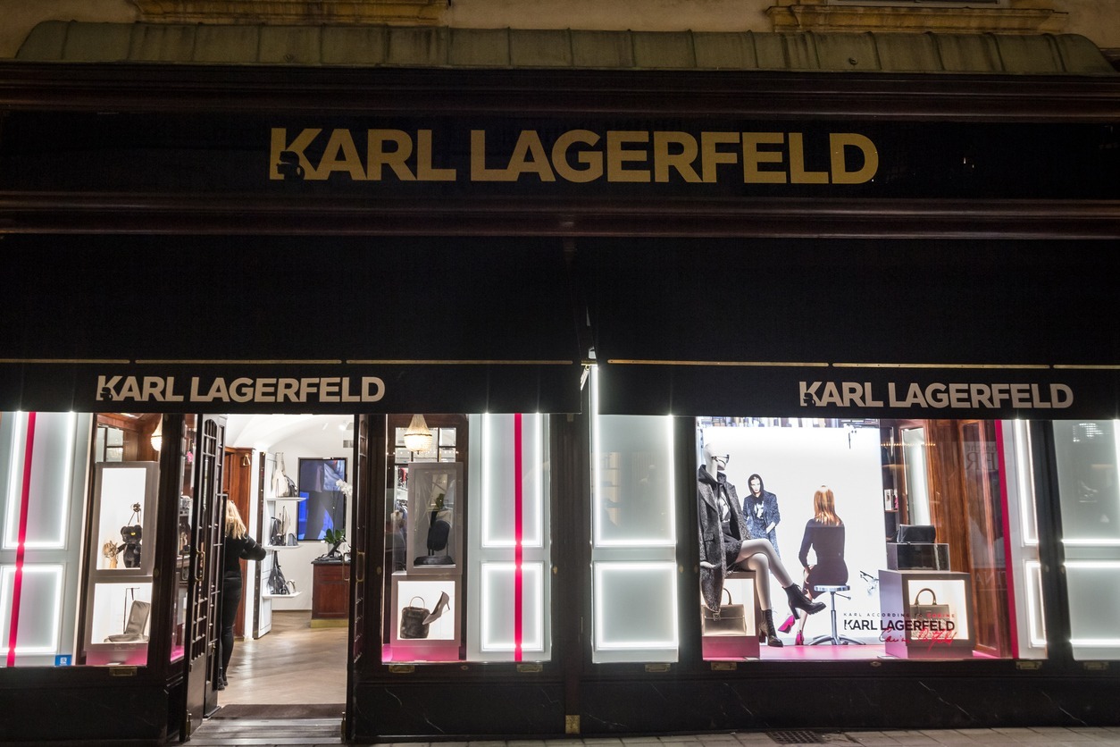Karl lagerfeld logo in front of their store in Vienna. Karl Lagerfeld was a French and German fashion designer, owning a chain of clothing stores.