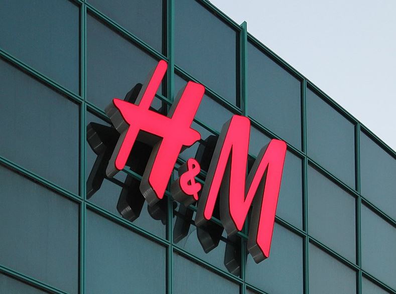 An H&M sign in front of a store