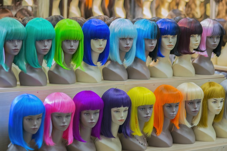 colorful wigs in a shop window at Chinatown in Bankok
