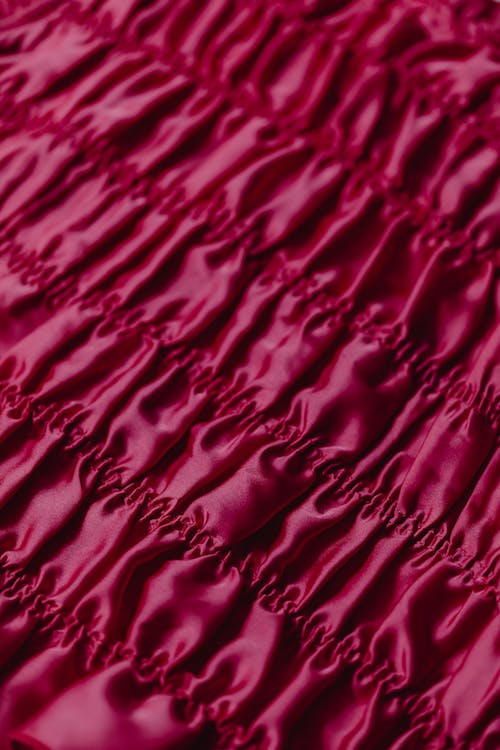 Close-up shot of a magenta fabric