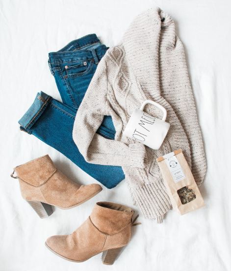 Gray cardigan, blue jeans, and pair of brown chunky heeled shoes